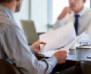 2-businessmen-CIO-CFO-Discussing-Data-Center-Economics